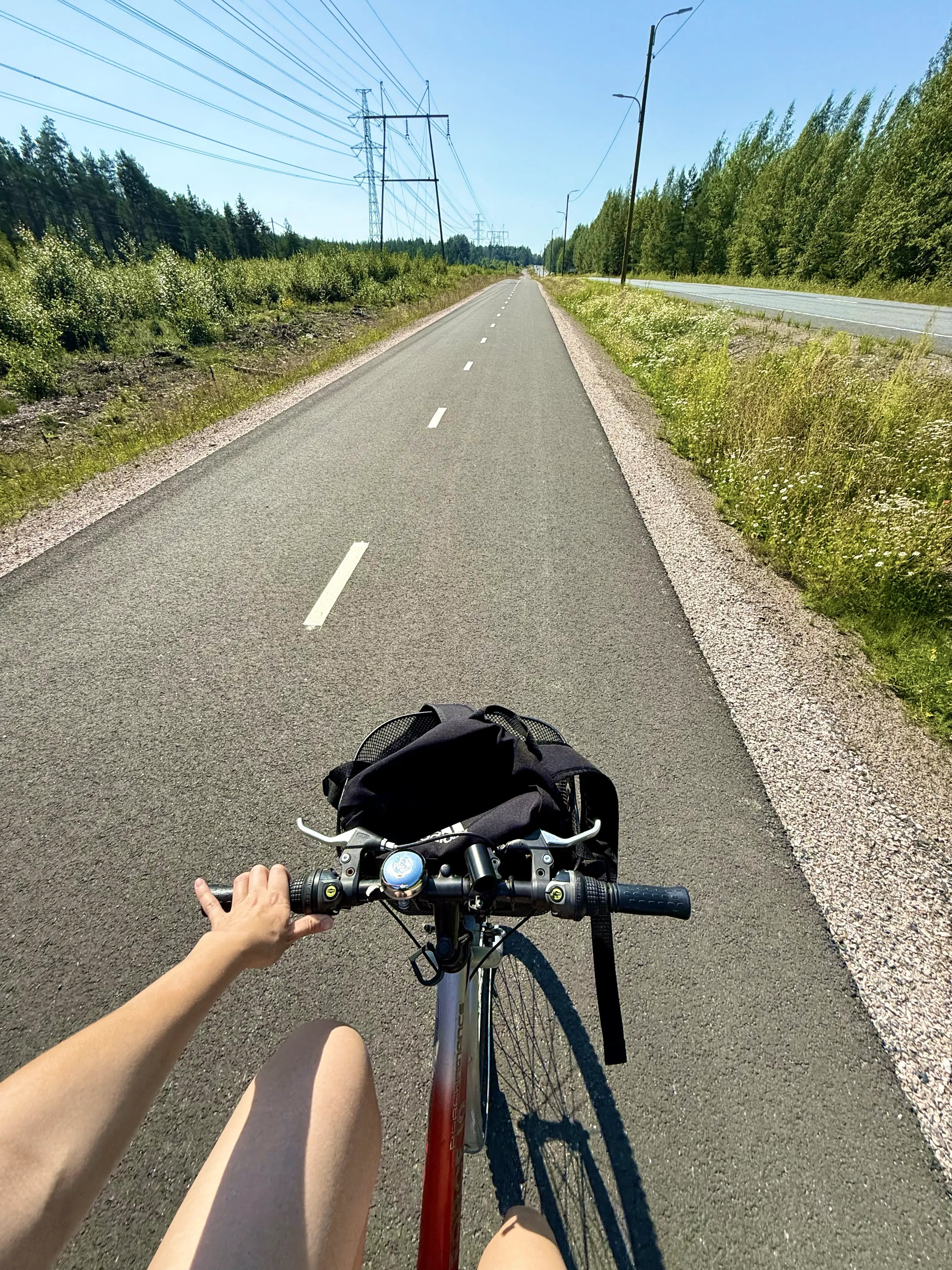 A bicycle on a quiet road through the Finnish countryside